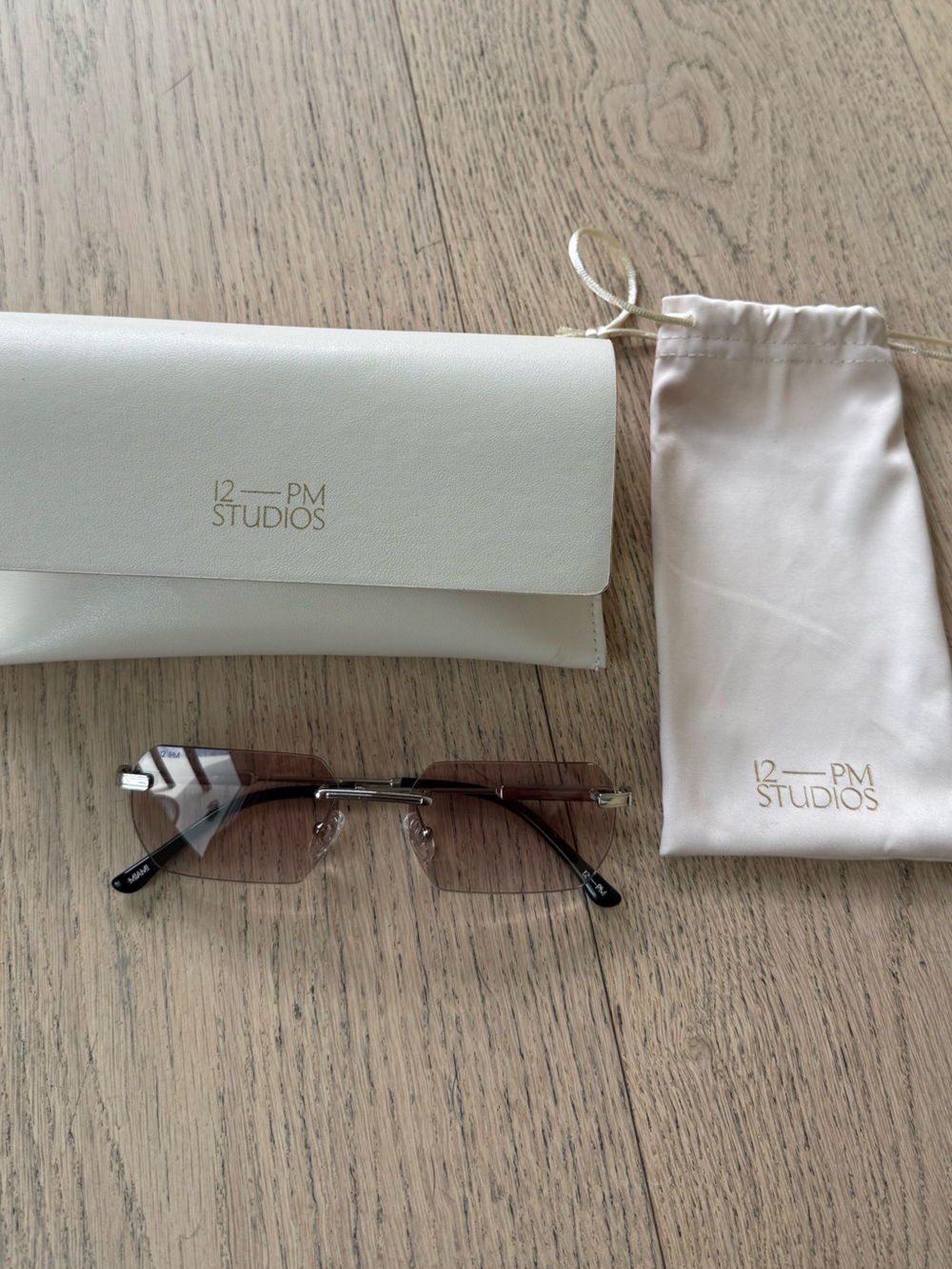 12—PM Studios Men's Rimless Sunglasses in Brown